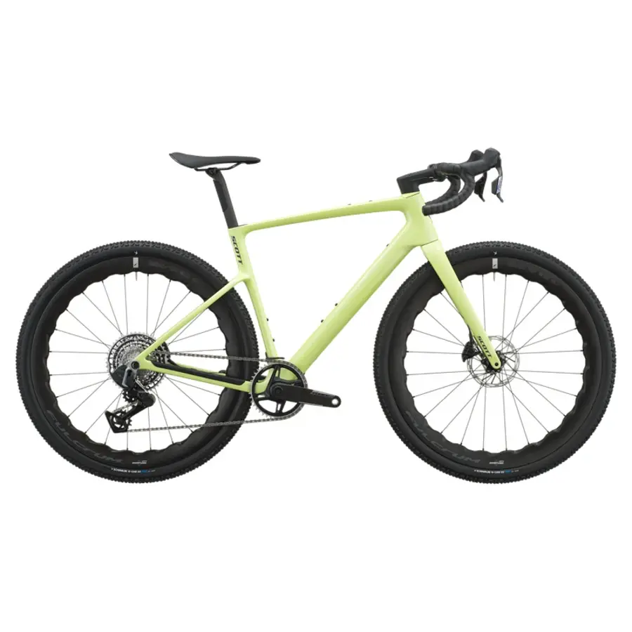 Bicicleta verde claro de corrida com pneus grossos e quadro em carbono