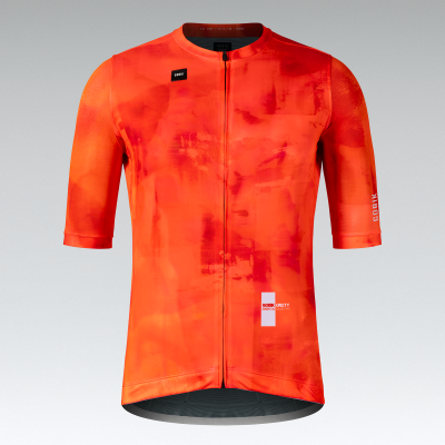 Camisola de ciclismo laranja com padrão vermelho e logos Gobik