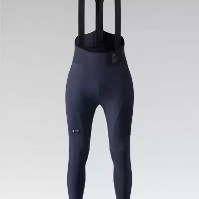 Calças compridas de ciclismo azul escuro com tiras para os ombros.