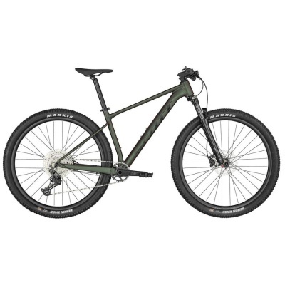 Bicicleta de montanha verde escuro com pneus Maxxis pretos