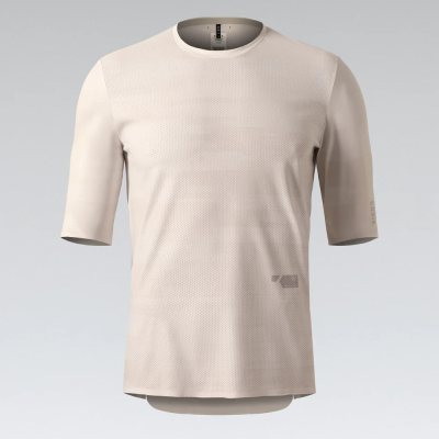 Camisola desportiva bege com textura tipo malha e mangas médias