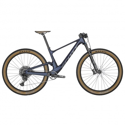 Bicicleta de montanha azul escuro com pneus Maxxis bege