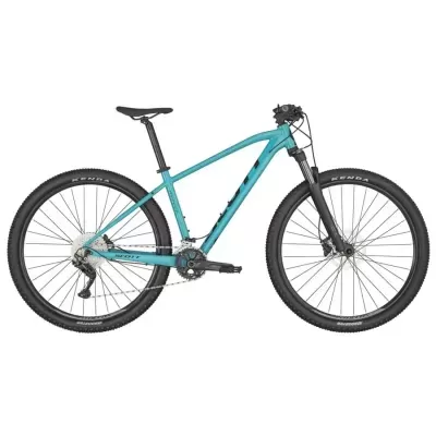 Bicicleta de montanha azul turquesa com pneus pretos e selim preto.