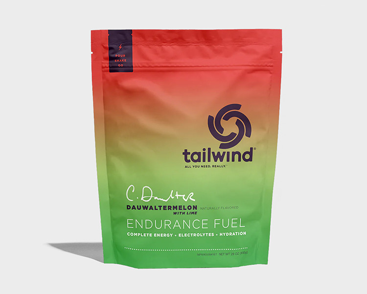 Saco de bebida energética Tailwind Endurance Fuel com design verde e laranja