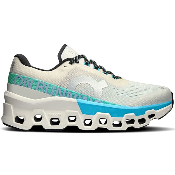 Ténis de corrida bege claro com detalhes azuis e sola branca recortada