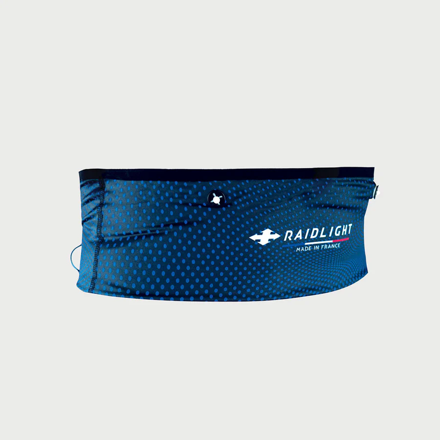 Faixa desportiva azul com padrão de pontos e logótipo Raidlight