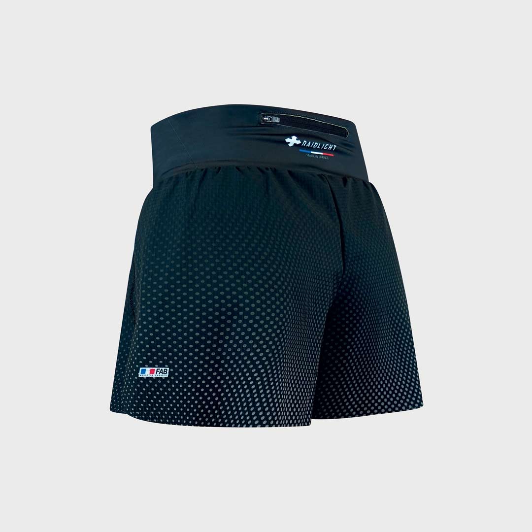 Calções desportivos pretos com padrão de pontos cinzentos e bolso com fecho na cintura