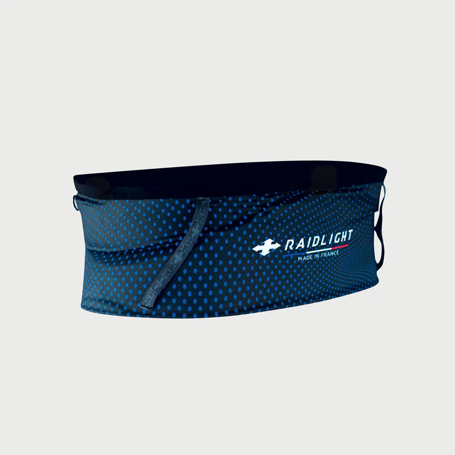 Cinto desportivo azul escuro com padrão de pontos azuis e texto RAIDLIGHT MADE IN FRANCE