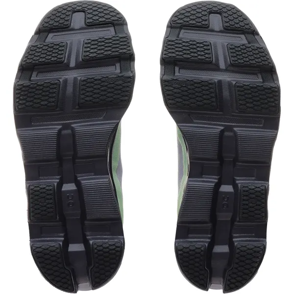 Solados pretos de sapatos desportivos com padrões antiderrapantes