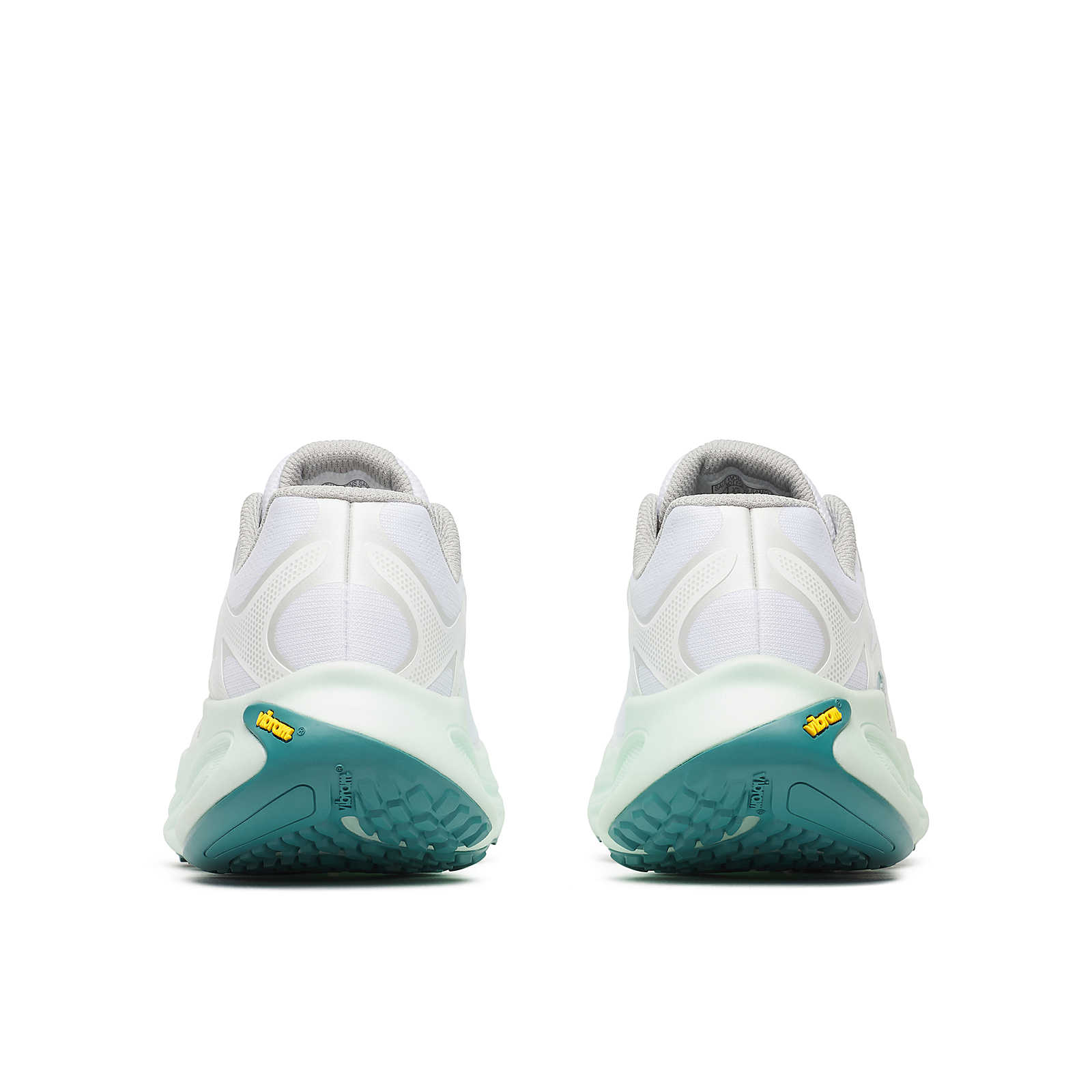 Sapatilhas desportivas brancas com sola azul esverdeada vistas de trás