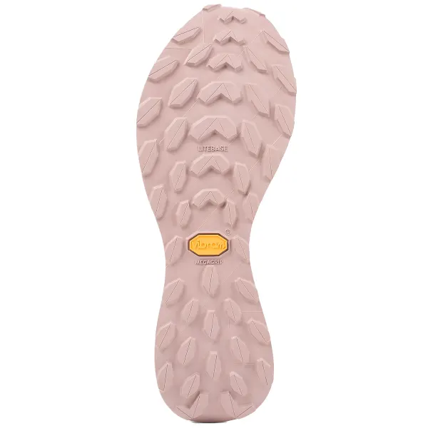 Sola de sapato rosa claro com padrão antiderrapante e logo Vibram amarelo