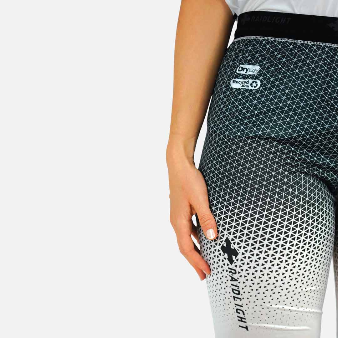 Leggings desportivas pretas e brancas com padrão geométrico e textos DryLight, Recycled 80%, RaidLight