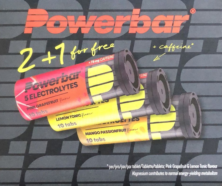 Três tubos Powerbar 5 Electrolytes com sabores variados e texto promocional