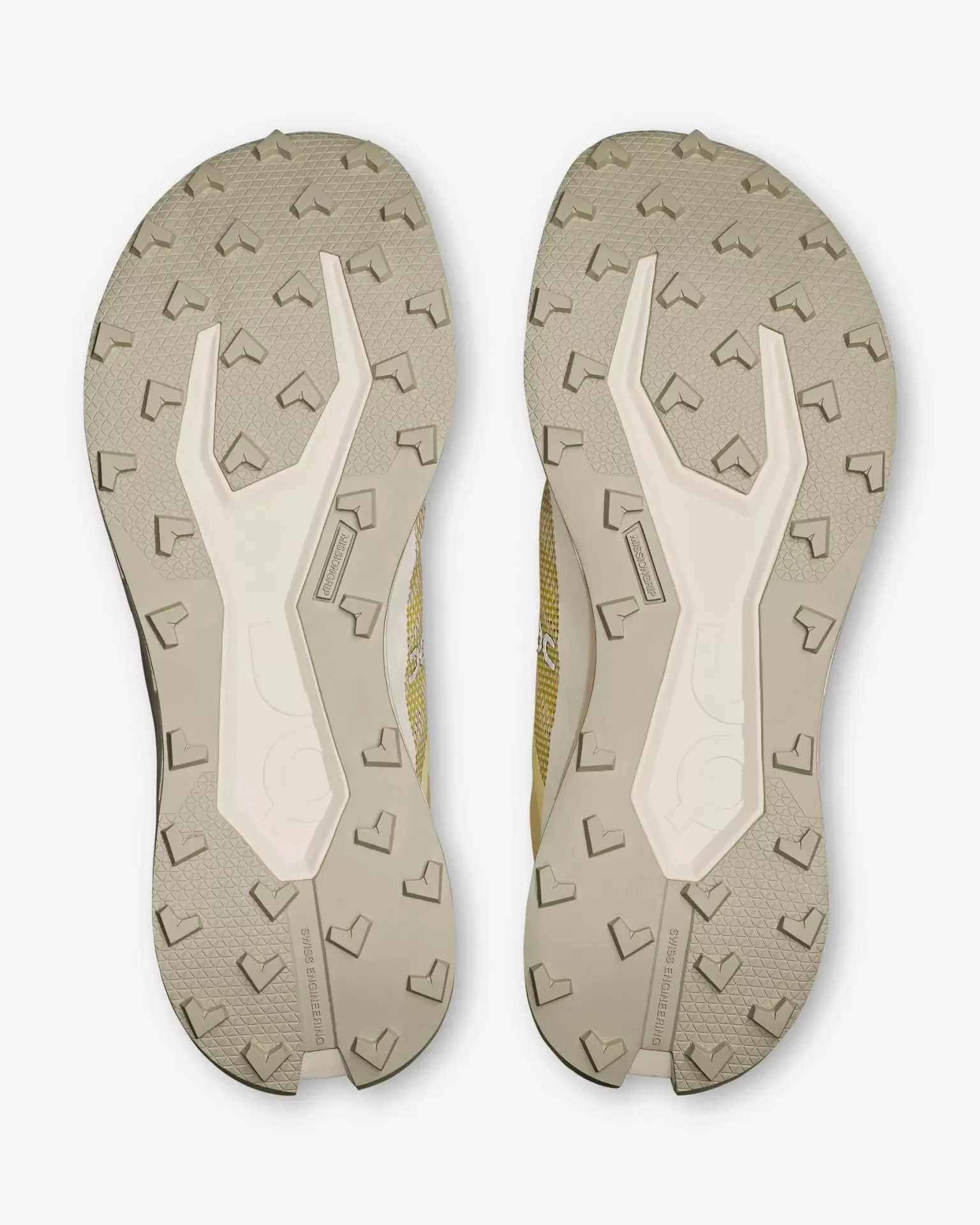 Solas de sapatos desportivos bege com padrão saliente