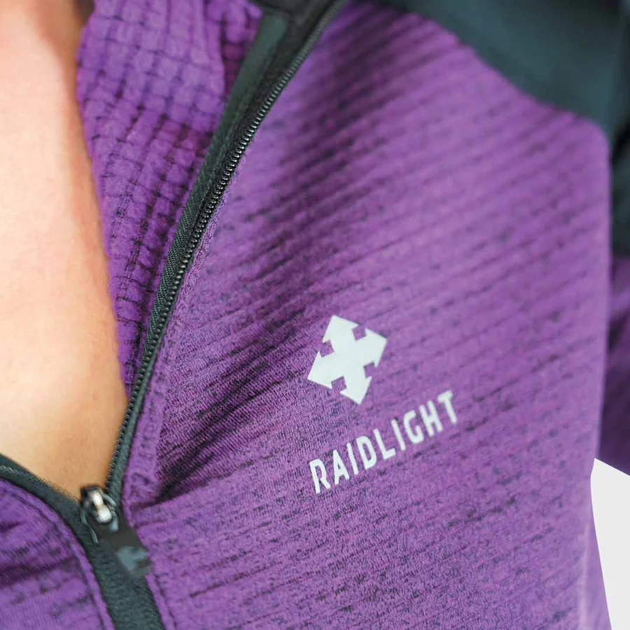 Roupa desportiva roxa com zíper e logótipo RAIDLIGHT