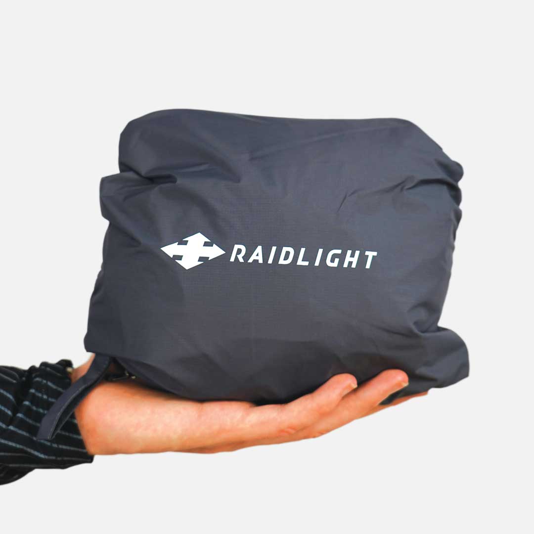 Peça de vestuário cinza escuro compactada com logo RAIDLIGHT