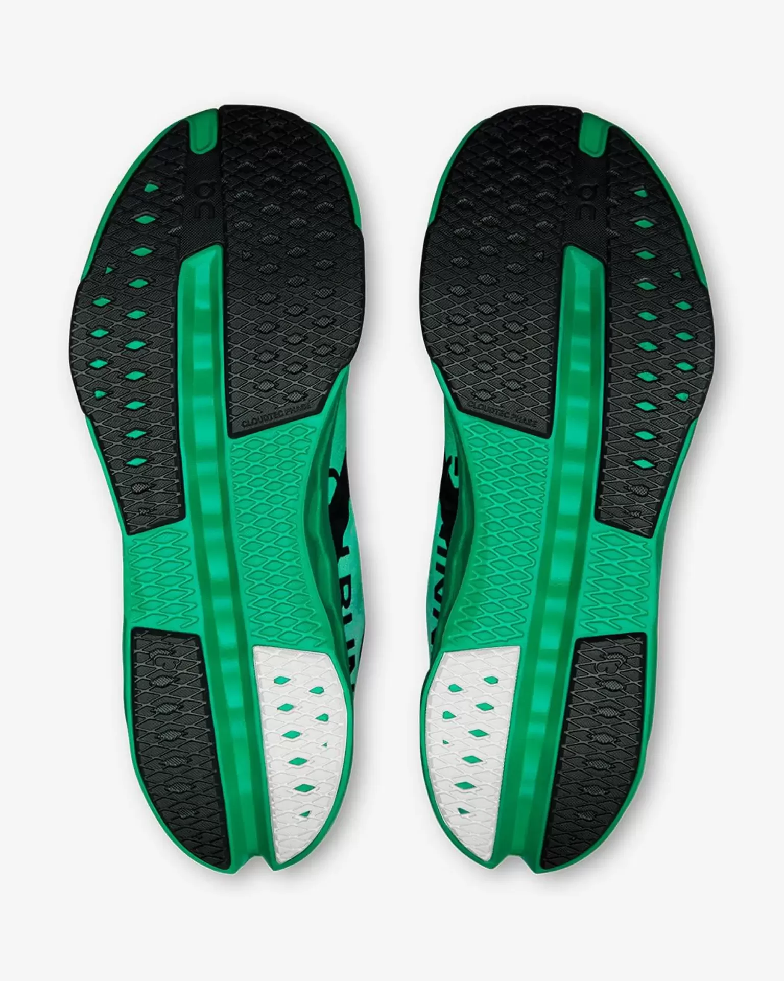 Solas de sapatos desportivos verde, preto e branco com padrão antiderrapante