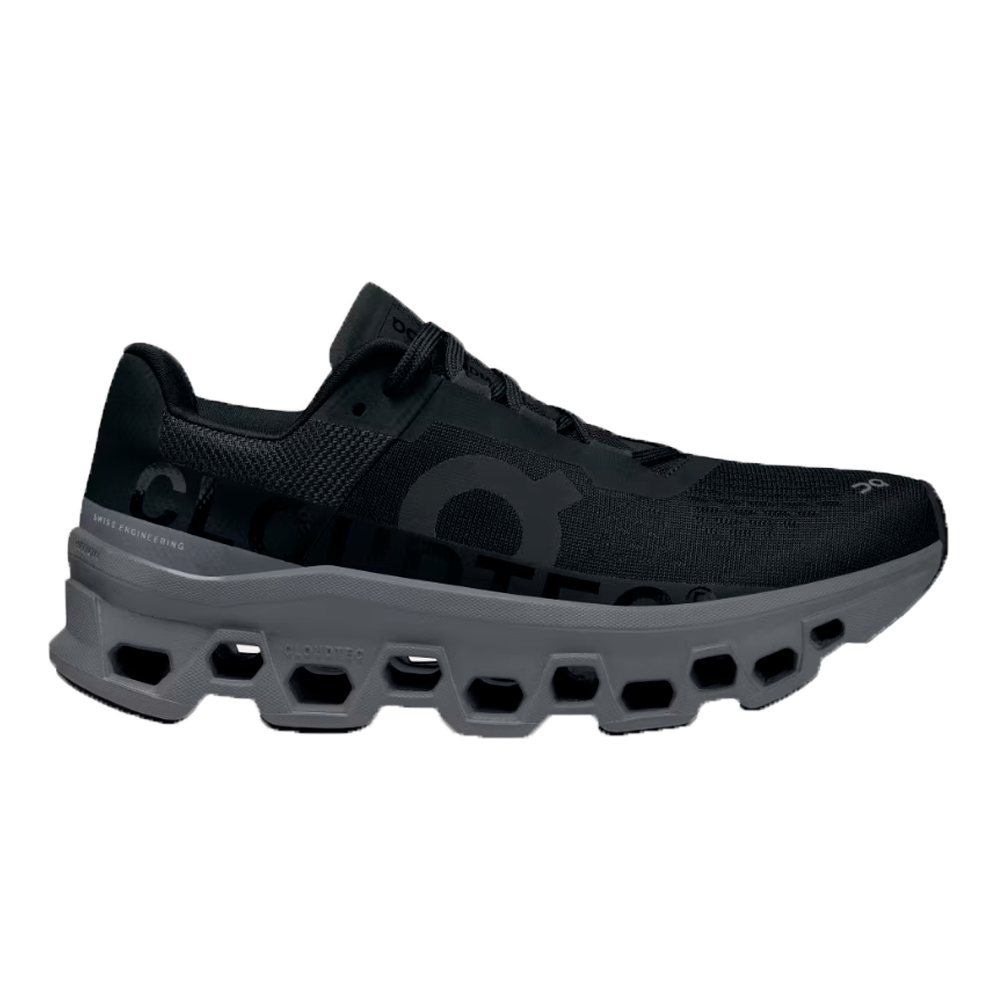 Ténis desportivos pretos com sola cinzenta e design ventilado