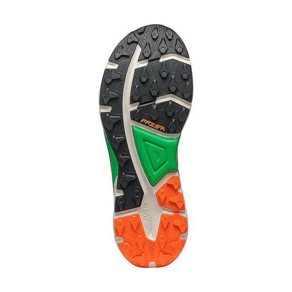 Sola de sapato desportivo com cores preta, laranja e verde