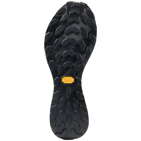 Sola preta de sapato com padrão em relevo e logótipo amarelo vibram