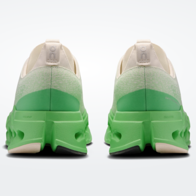 Sapatilhas desportivas com sola verde vibrante e parte superior branca e verde claro