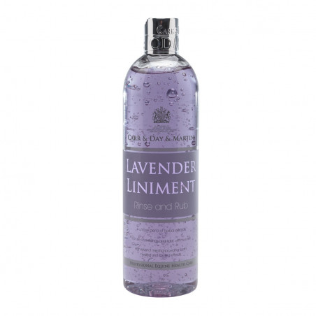 Frasco transparente com líquido roxo e rótulo Lavender Liniment
