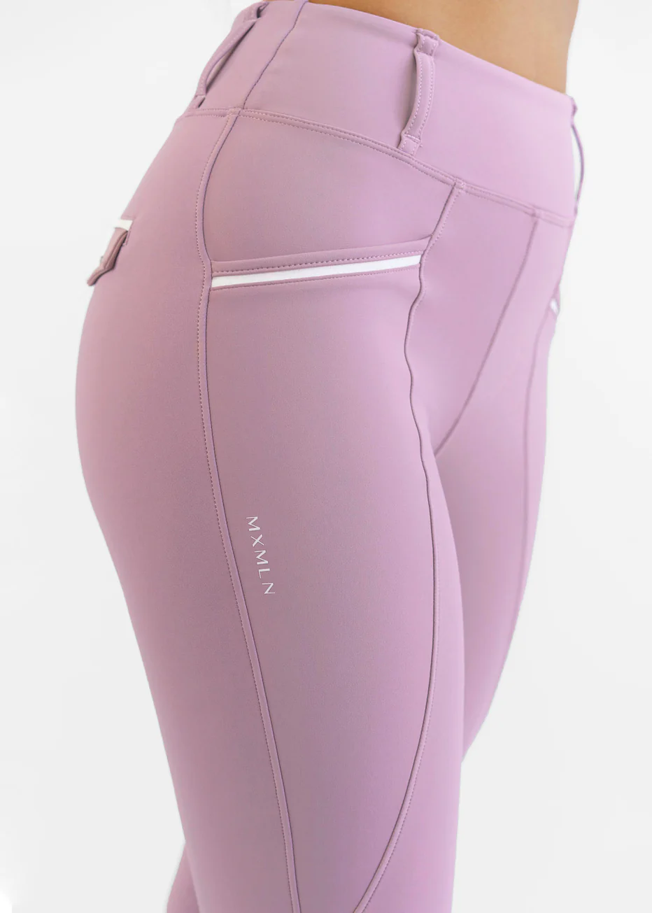 Leggings desportivas rosa claro com detalhes brancos e texto MXMLN