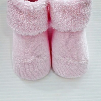 Meias cor de rosa para bebé com parte superior felpuda