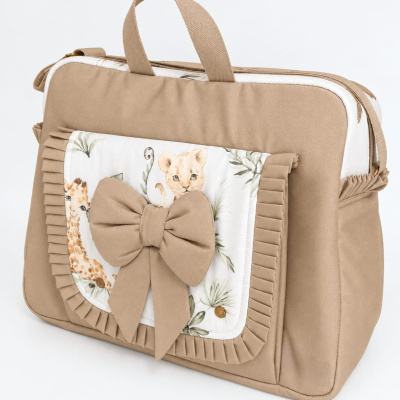 Mala bege de tecido com bolso estampado e laço frontal.