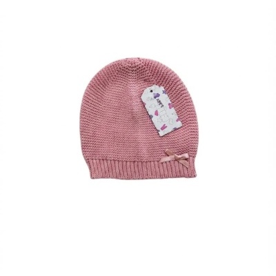 Gorro rosa de malha com laço e etiqueta