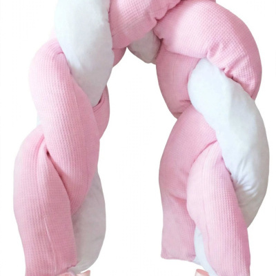 Almofada trançada rosa e branca com laços de fita