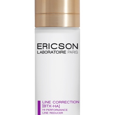 Frasco branco com tampa dourada de produto cosmético Ericson Laboratoire Paris