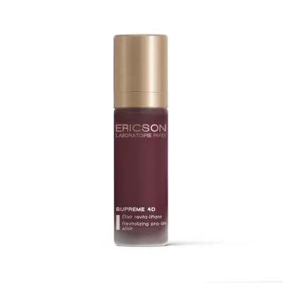 Frasco de elixir roxo com tampa dourada da ERICSON LABORATOIRE PARIS