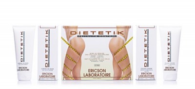 Conjunto de produtos Dietetik da Ericson Laboratoire com tubos brancos e caixa central com figura feminina e fita métrica.