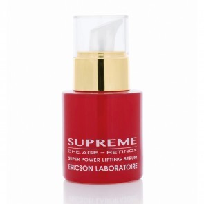 Frasco de sérum para cuidados da pele vermelho com tampa dourada e texto branco