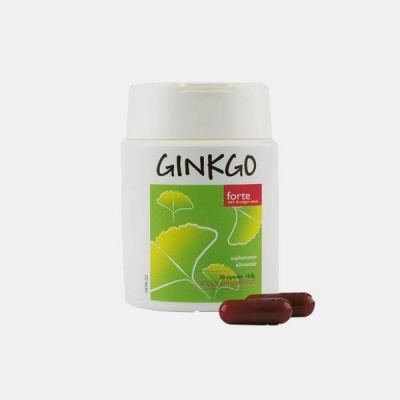 Frasco de suplemento alimentar GINKGO com cápsulas ao lado