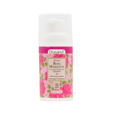 Frasco branco de sérum facial com rótulo rosa e flores de rosa mosqueta.