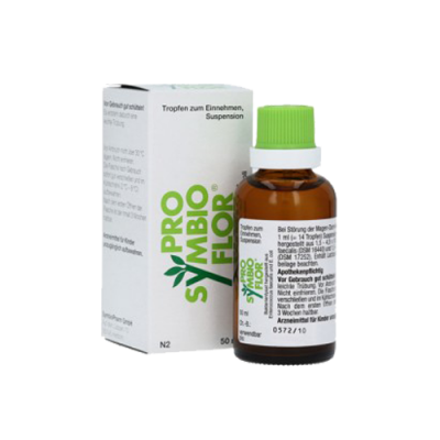 Frasco âmbar com tampa verde e embalagem branca do medicamento Pro Symbio Flor