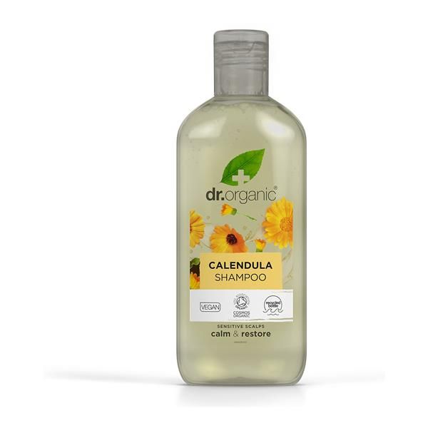 CHAMPÔ CALÊNDULA BIO 265 ML - DR. ORGANIC Frasco de champô Calendula da dr.organic com flores amarelas no rótulo