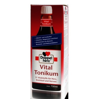 Frasco vermelho e embalagem branca e vermelha do suplemento Doppelherz Vital Tonikum de 750 ml