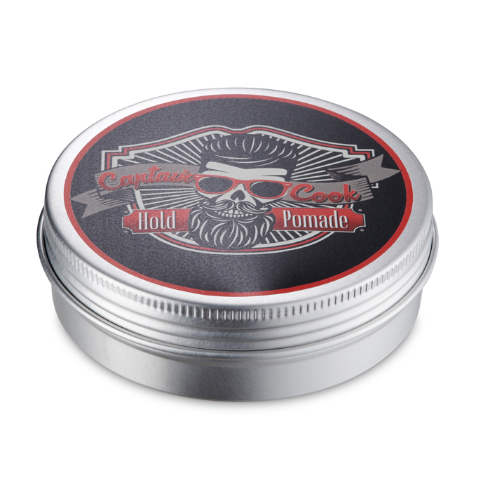 Lata metálica redonda com rótulo preto e vermelho com crânio e texto Pomade.