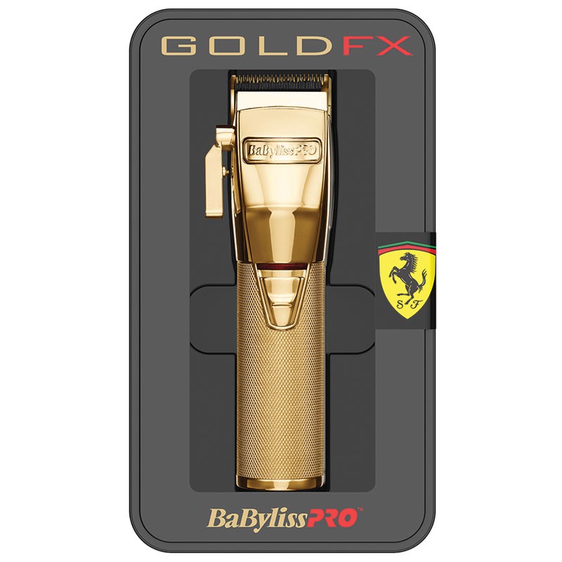 Máquina de cortar cabelo dourada BaBylissPRO GOLD FX na caixa preta