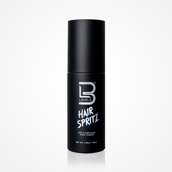 Spray capilar preto com texto branco, fundo branco.