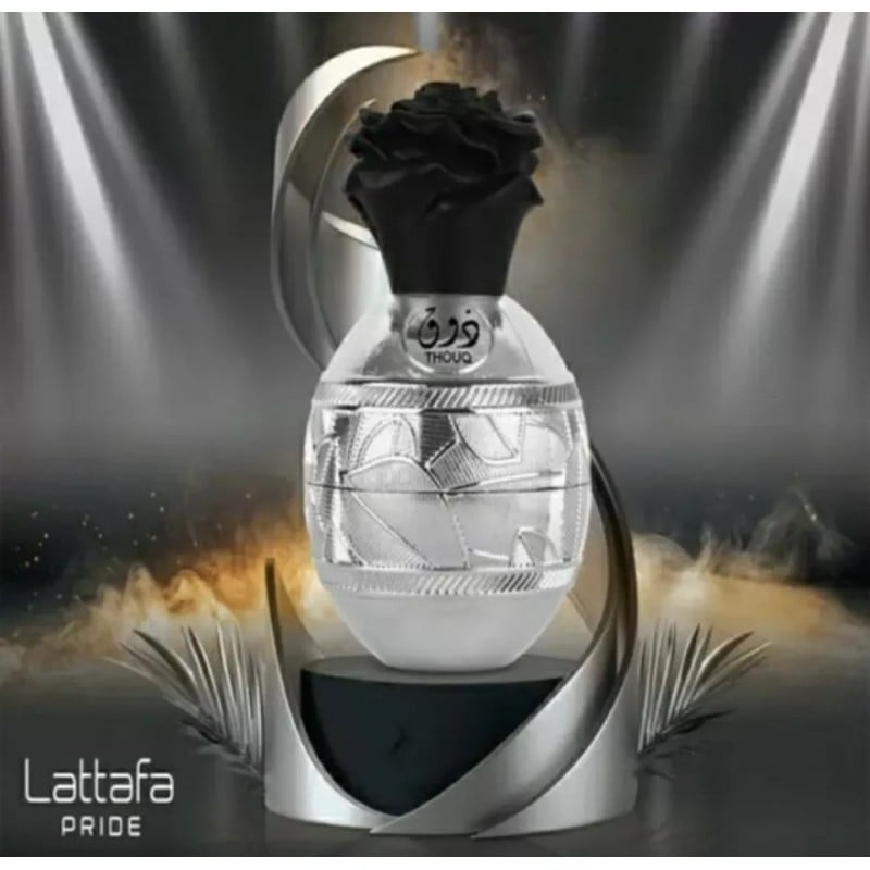 Frasco de perfume Lattafa PRIDE com tampa preta em forma de flor e vidro transparente decorado