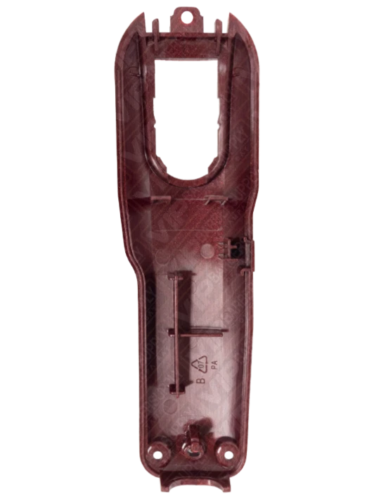 Peça plástica castanho com corte retangular e detalhes internos