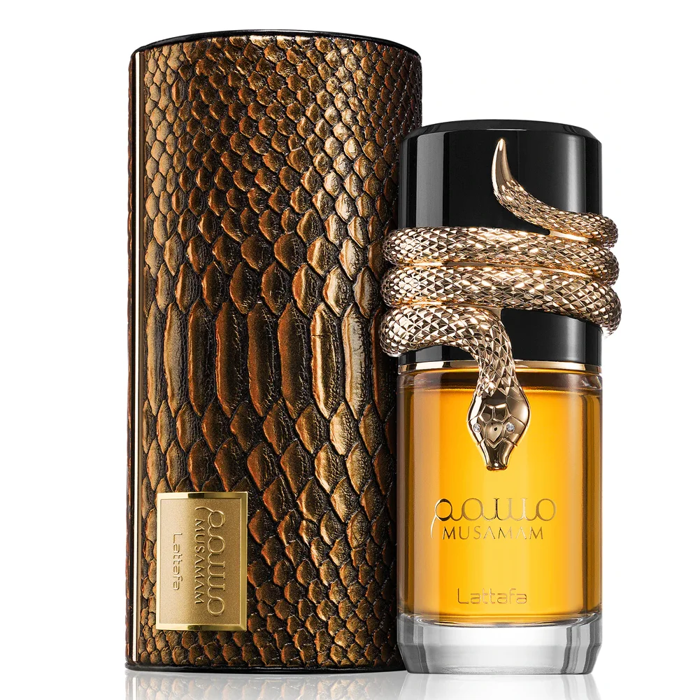 Frasco de perfume com detalhe de serpente dourada e caixa com padrão de pele de cobra