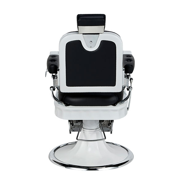 Cadeira de barbeiro preta e branca vista de trás