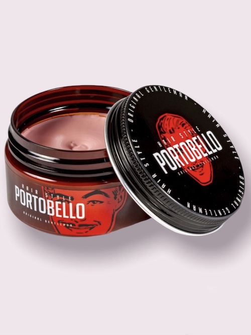 Pomada capilar PORTOBELLO em embalagem redonda com tampa preta e creme cor rosa claro