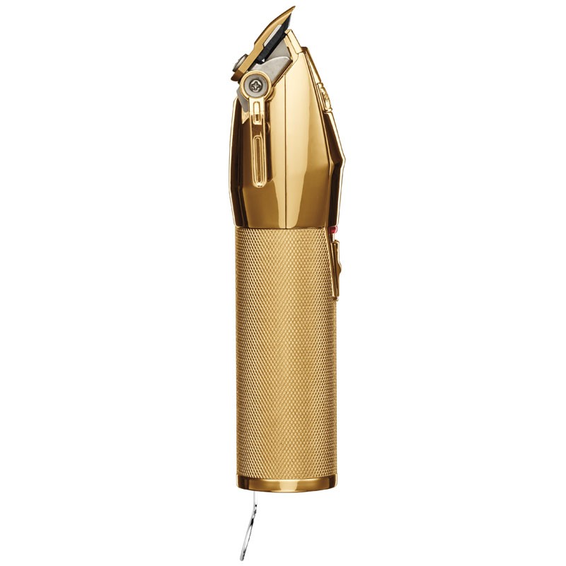 Máquina de cortar cabelo dourada com corpo texturizado e lâmina metálica