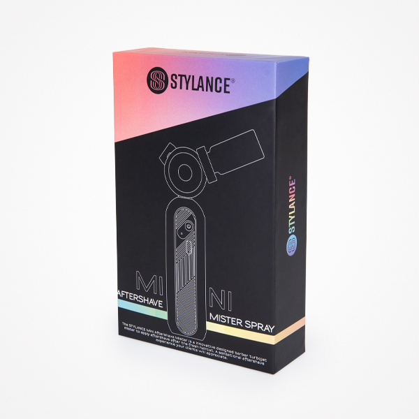 Embalagem de produto STYLANCE MINI MISTER SPRAY AFTERSHAVE preta com detalhes rosa e roxos